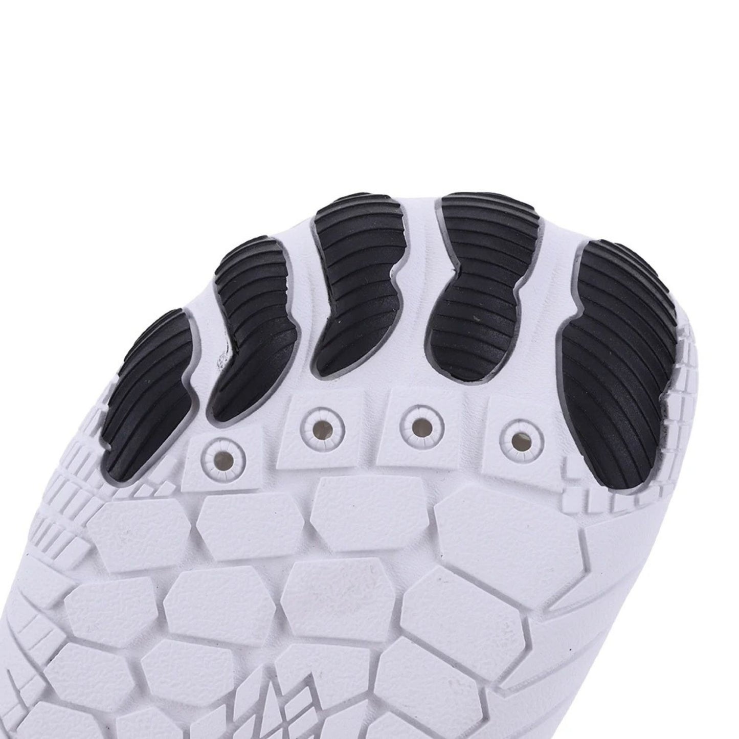 Close-up view of white barefoot shoe sole showing black toe and heel grip pads.