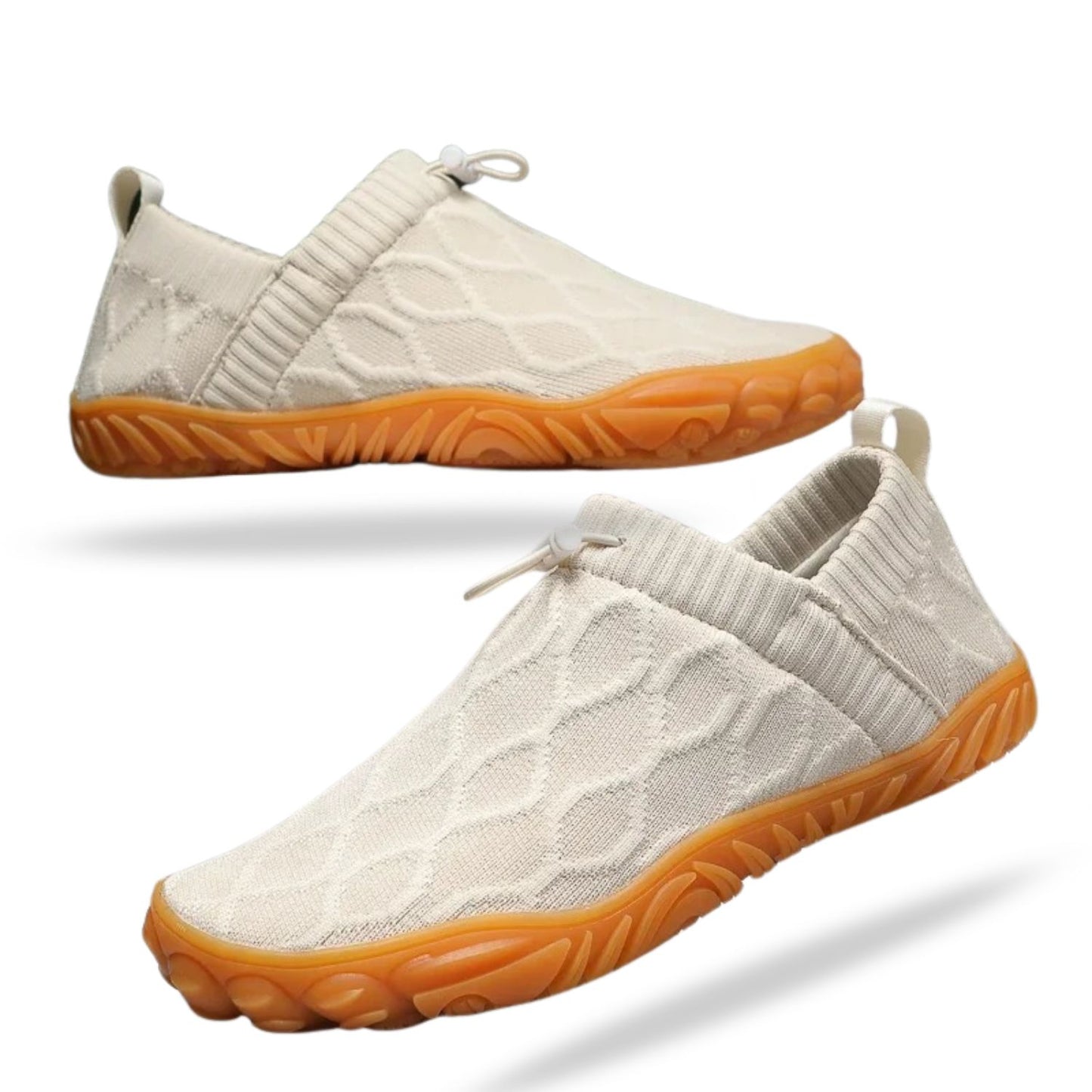 White slip-on casual shoe with textured pattern and orange sole, side profile.