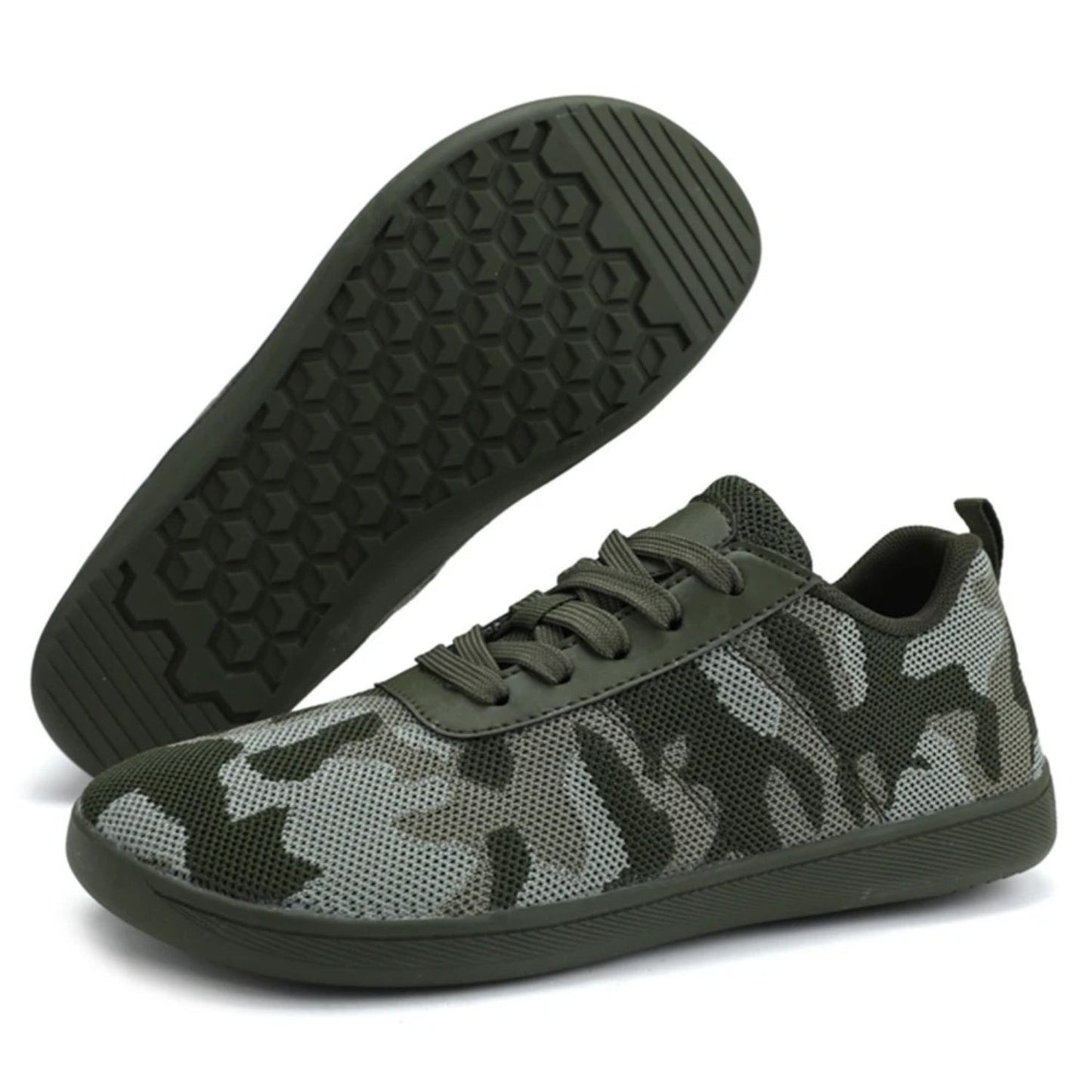 Black and white camouflage knit sneaker with lace-up front and dark sole.