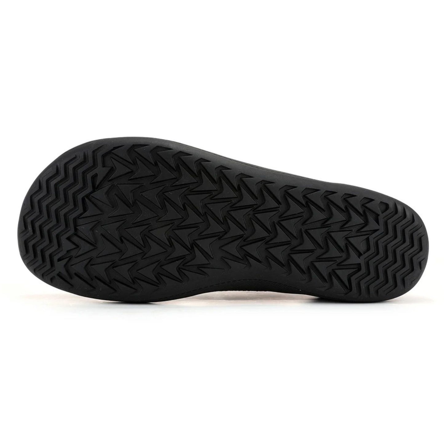 Bottom view of black knit sneaker showing textured rubber sole pattern.