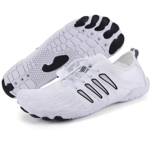 White five-toe barefoot shoe with black accents and textured sole, shown from side and bottom view.