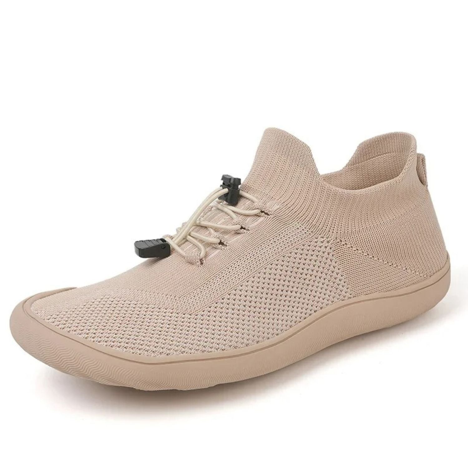 Beige minimalist barefoot sneaker with mesh knit upper and toggle laces, side view.