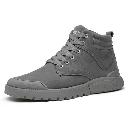 Gray lace-up winter boot with padded collar and thick sole, side profile view.