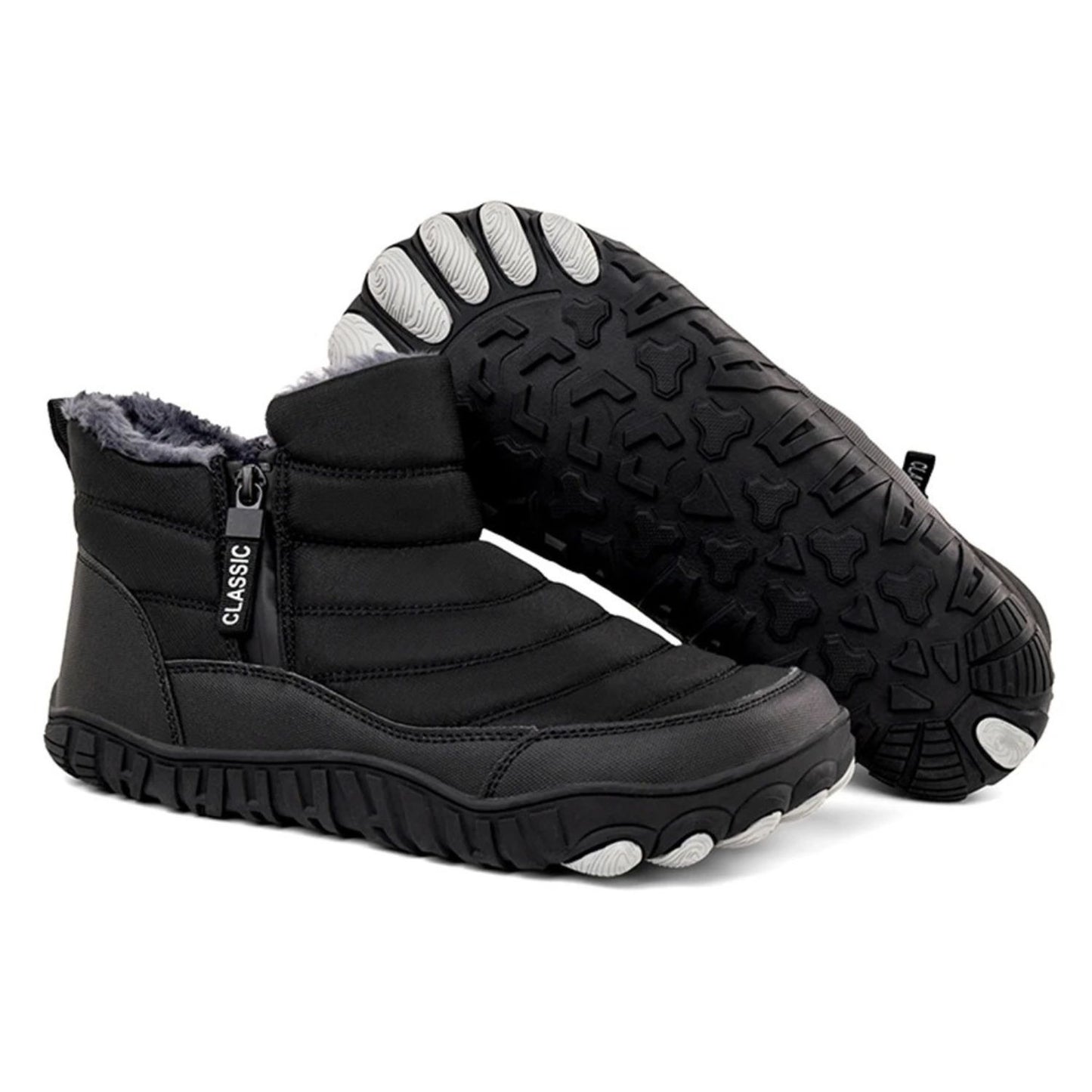 Black winter ankle boot with thick sole and side zipper, angled for sole visibility.