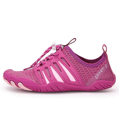 Magenta and pink water shoe with adjustable bungee laces, angled side view.