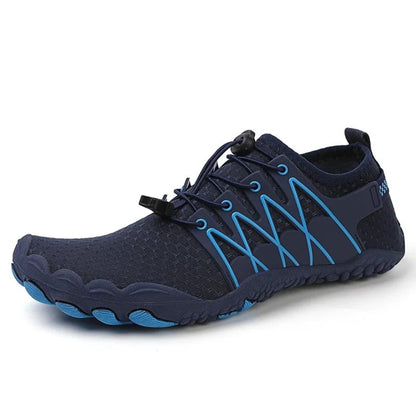 Black water shoe with blue criss-cross design and rubber sole, side view.