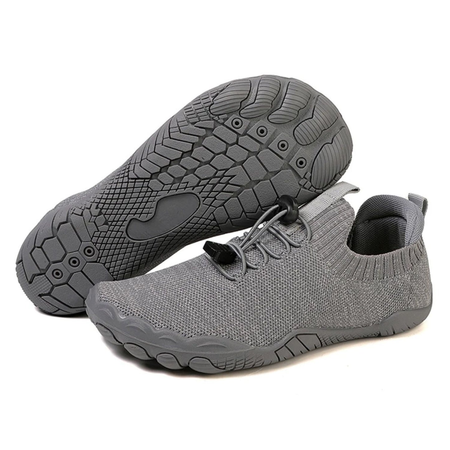 Gray barefoot shoe with knit upper and black textured sole, shown from side and bottom view.