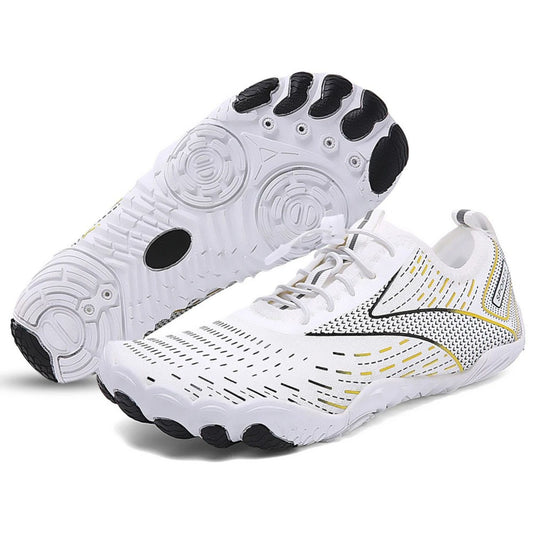 White barefoot shoe with yellow and black accents, shown from side and bottom view with circular textured sole.