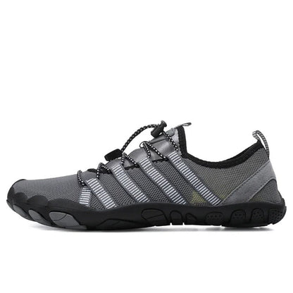 Gray water shoe with black sole and adjustable elastic laces, shown from the side.